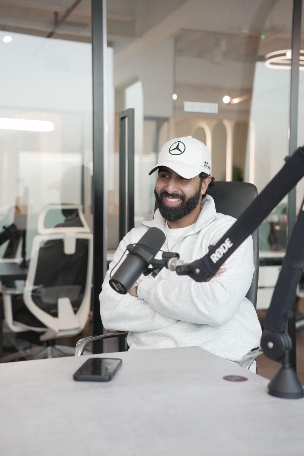 Atif on a podcast